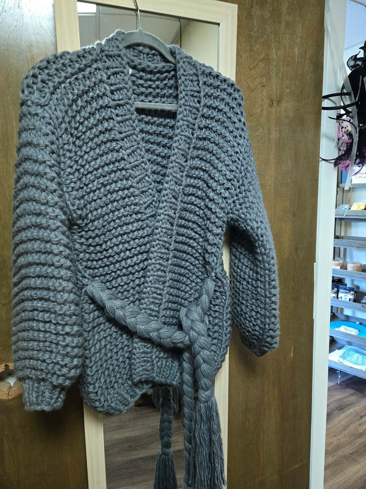 Grey knit sweater with braided belt